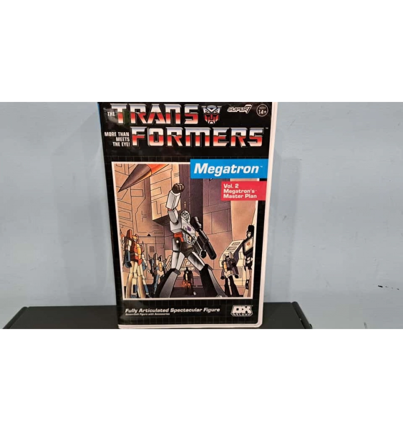 SUPER7 Deluxe 變形金剛 密卡登(VHS包裝) 7吋可動人偶